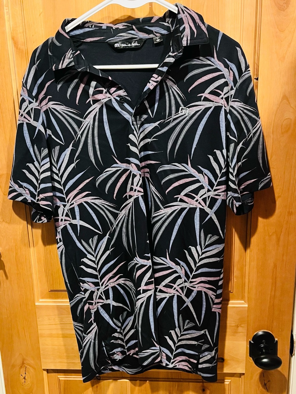 Travis Mathew Black Short-Sleeve Polo with Pastel Leaf Print